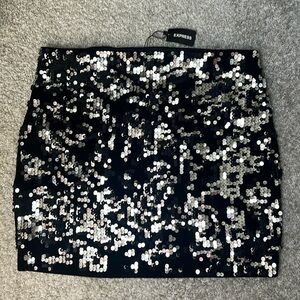 Fully lined Express sequins skirt.